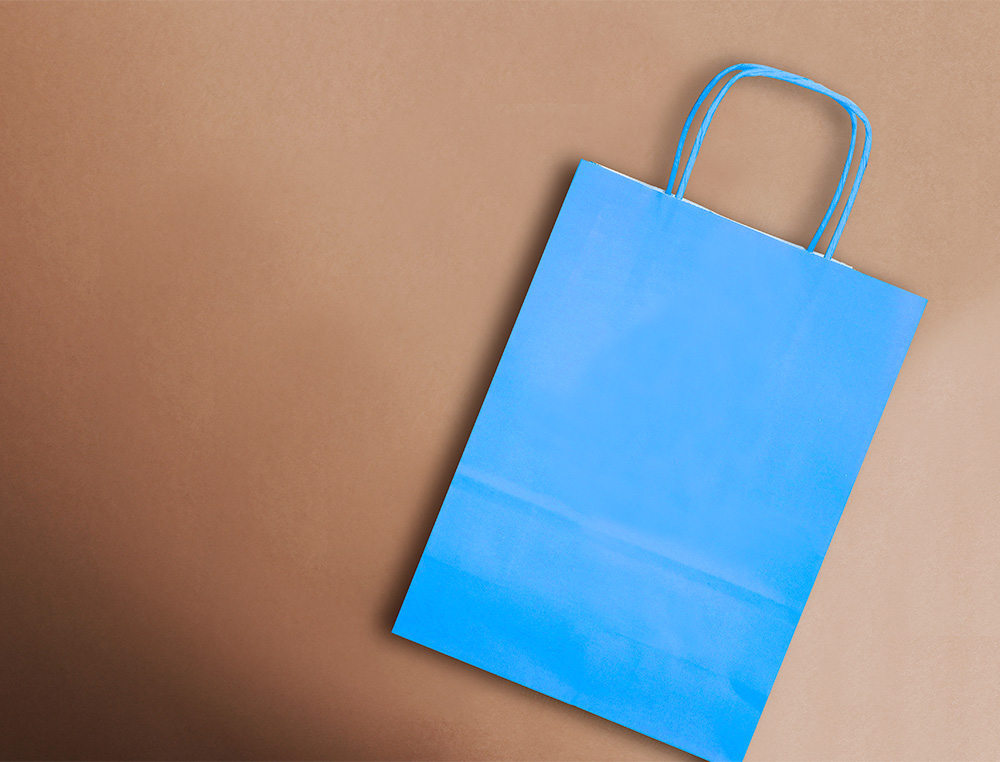 SACO DE PAPEL Q-CONNECT CELULOSE CELESTE M COM ASA TORCIDA 270X370X12 MM