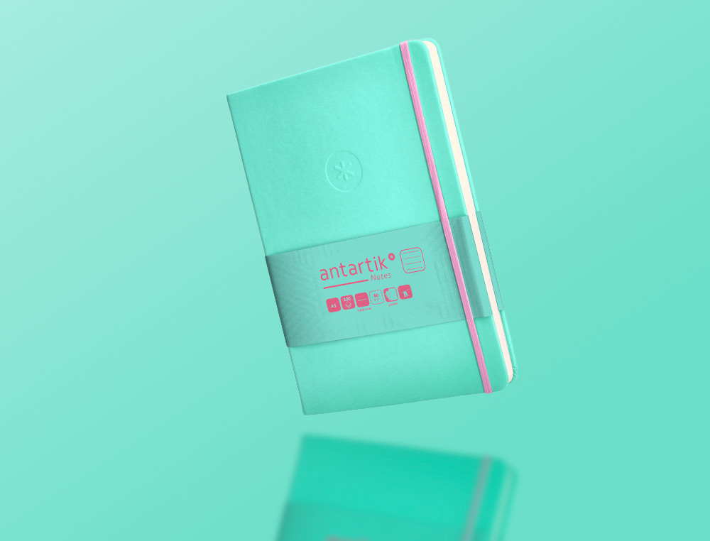 CADERNO COM ELASTICO ANTARTIK NOTES CAPA DURA A5 PAUTADO ROSA E TURQUESA 100 FOLHAS 80 GR FSC