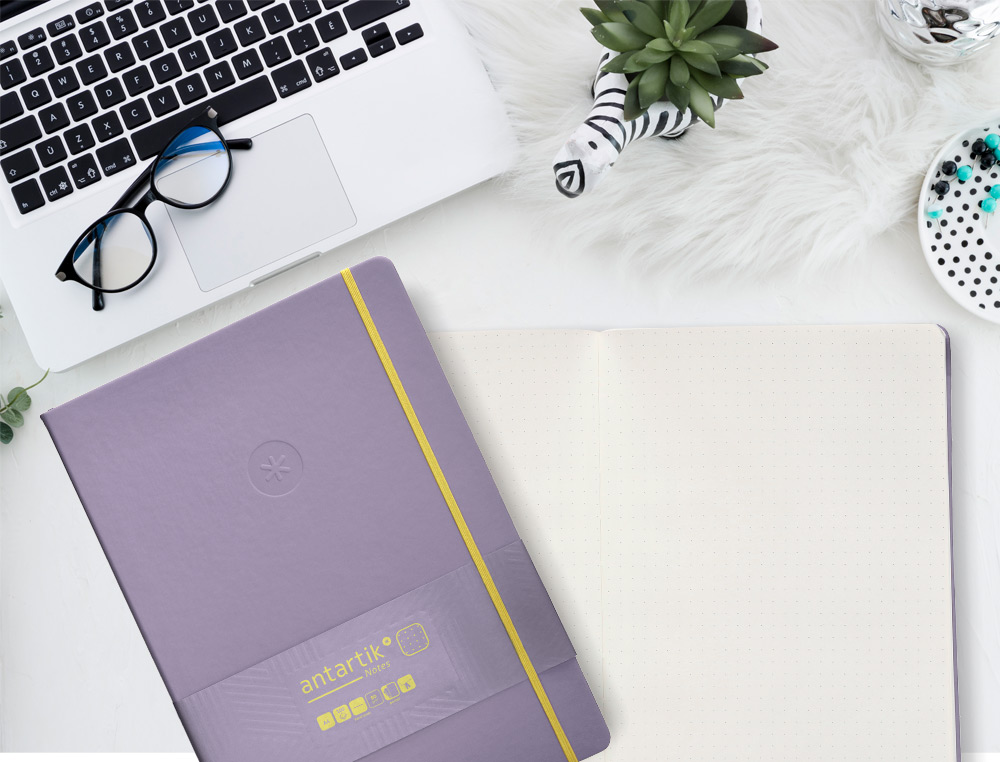 CADERNO COM ELASTICO ANTARTIK NOTES CAPA DURA A4 PONTILHADO ROXO E AMARELO 100 FOLHAS 80 GR FSC
